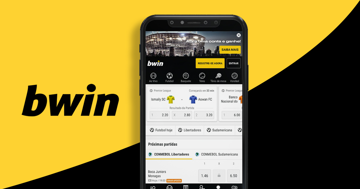 imagem mostra smartphone aberto na página inicial da Bwin. Ao lado, a logomarca da casa de apostas.